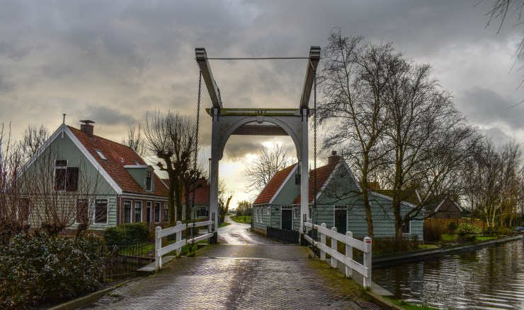 Theun is shining on an old bridge, in Zuiderwoude village, Amsterdam north.