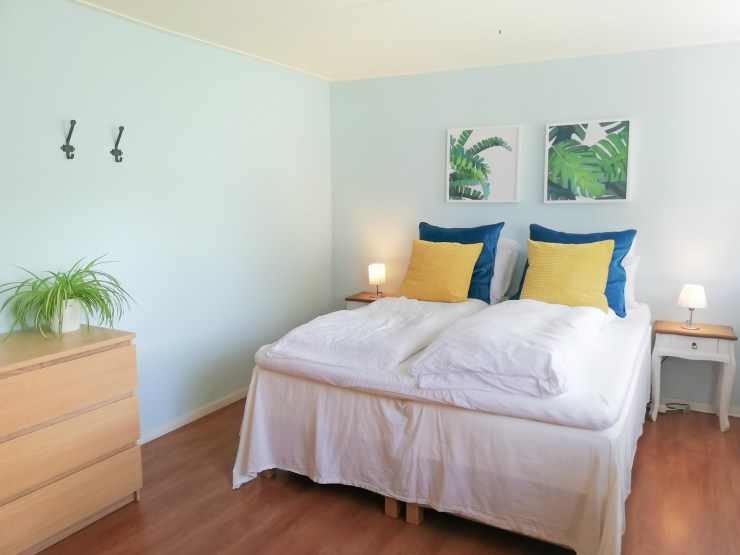 Master bedroom with a queen size boxspring